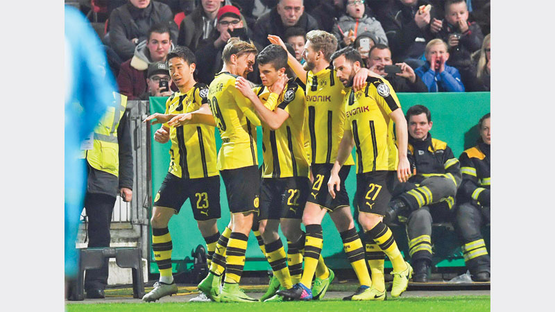 Dortmund set up German Cup semi against Bayern