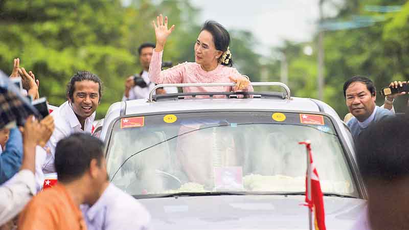 Suu Kyi urges brave votes