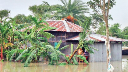 Ferry terminal, homesteads submerged in tidal surge