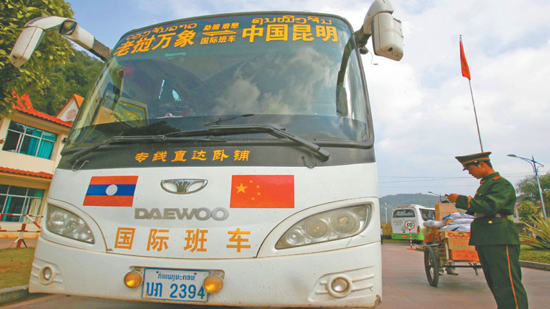 Three visits to Vientiane