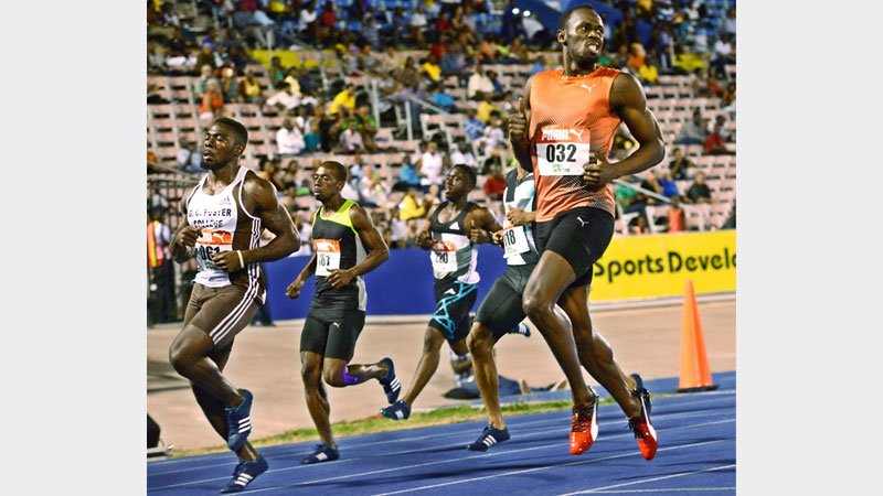 Bolt breezes into semis at Jamaican trials