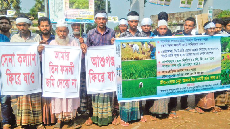 Agriculturists for expanded farming of flood-tolerant rice