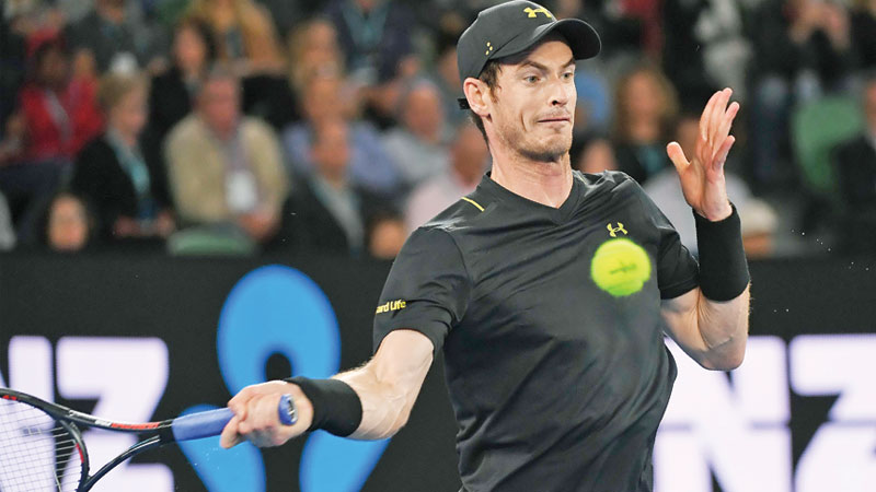 Murray, Federer storm into 3rd round 