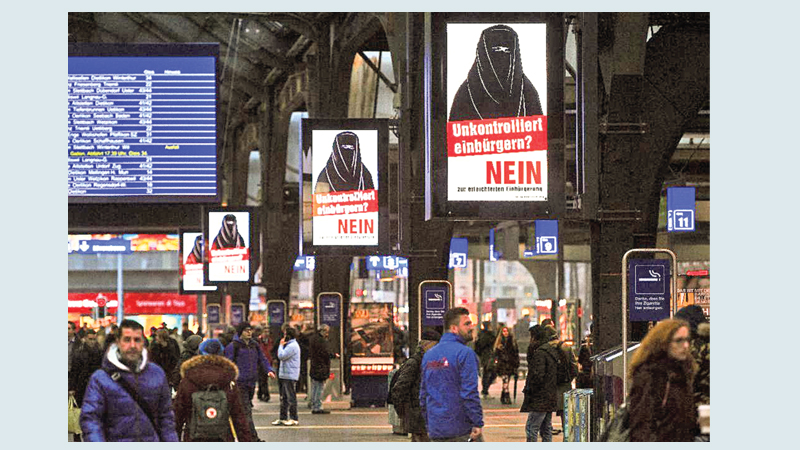 Anti-Muslim poster clouds Swiss citizenship vote