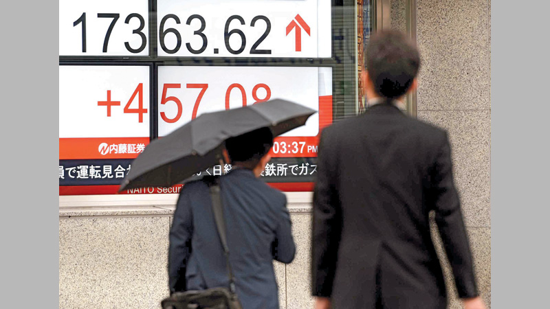 Asia markets track Wall St, oil higher
