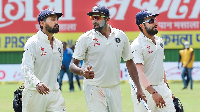 Ashwin, Jadeja help India win landmark 500th Test