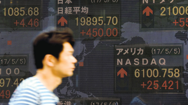 Asia markets rise on US jobs data, euro dips after Macron rally	