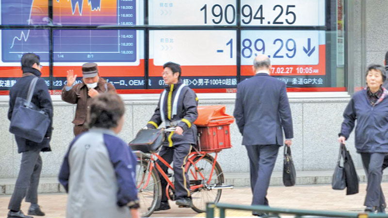 Asia markets end week on quiet note as US healthcare bill returns
