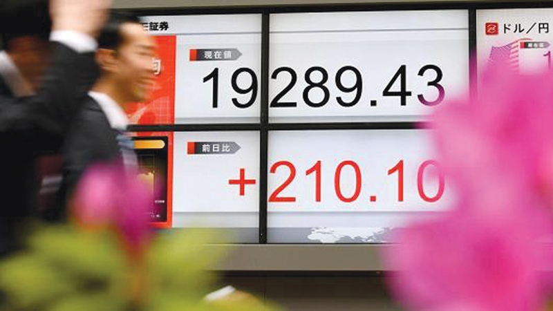 Asia markets mostly higher as traders absorb US jobs data
