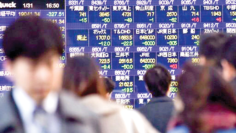 Asia stocks retreat after week-long Trump rally