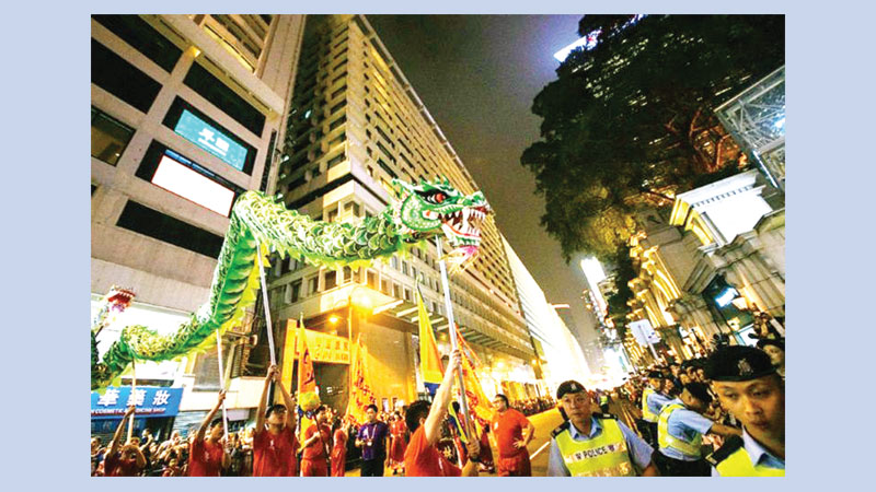 Asian markets fall on US-China talks, gloomy growth forecasts