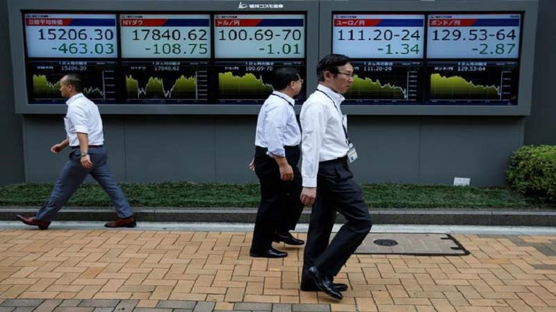 Asian markets largely defy negative Wall Street lead

