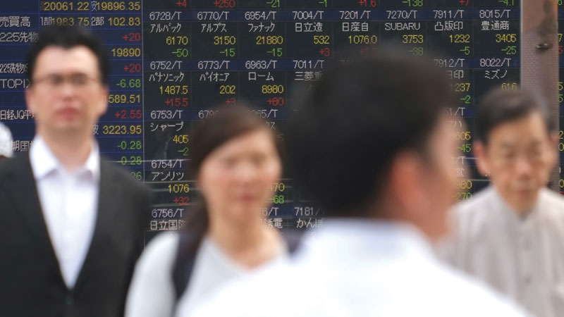 Asian markets down, oil slide hits energy firms