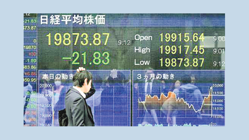 Asian markets tumble as China-US trade tariffs loom