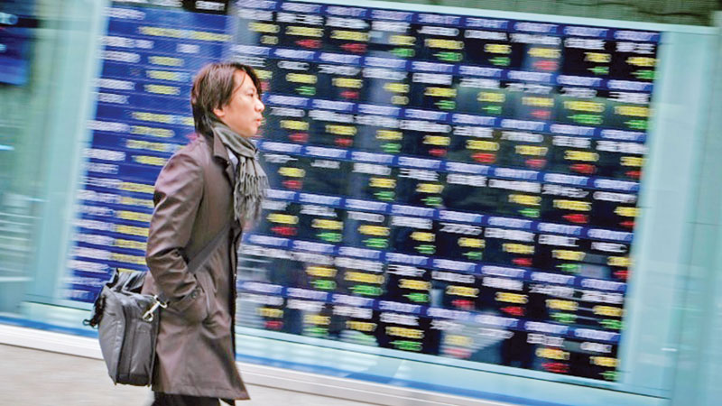 Asian traders on edge ahead of key global events