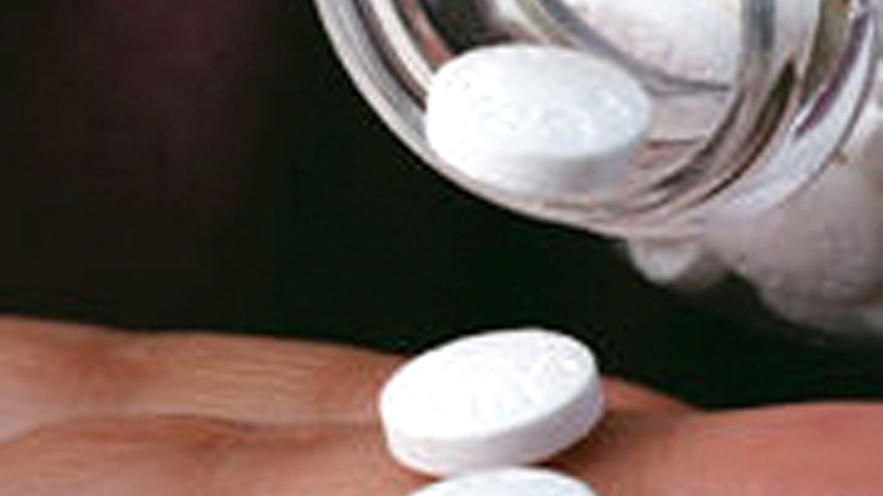 Daily low-dose aspirin linked to reduced risk of certain cancers
