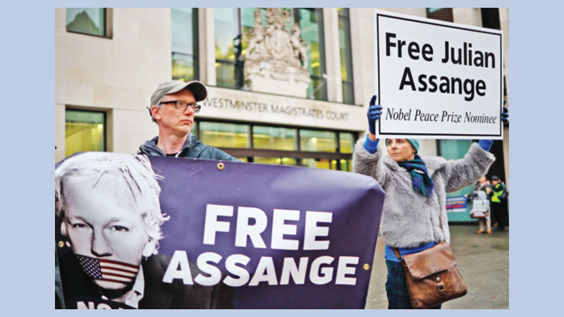 Assange testifies in embassy spying case