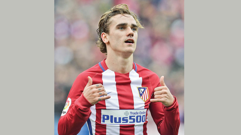 Griezmann lifts Atletico to fourth