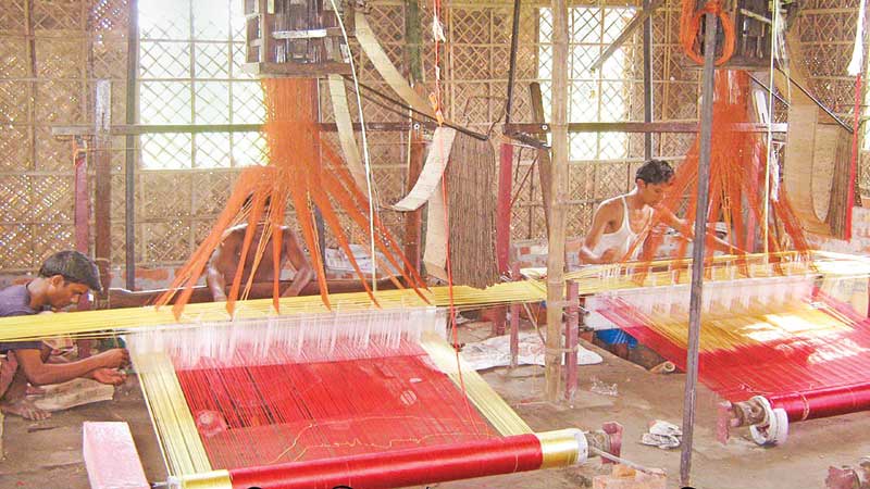 Weavers busy as sari demand rises for Eid
