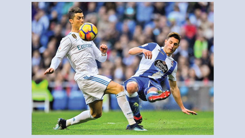 Real defy crisis talk as Barca extend lead