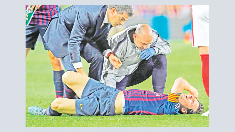 Barca win tarnished by Messi injury