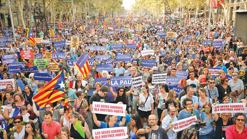 ‘Not afraid’: Defiant Barcelona marches against terror