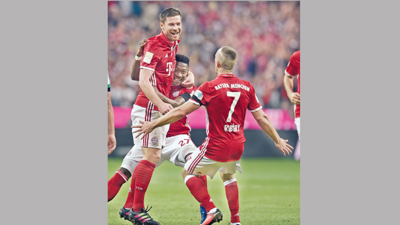 Champions Bayern start on flying note 
