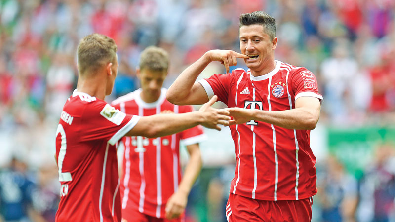 Bayern ride on Lewandowski double