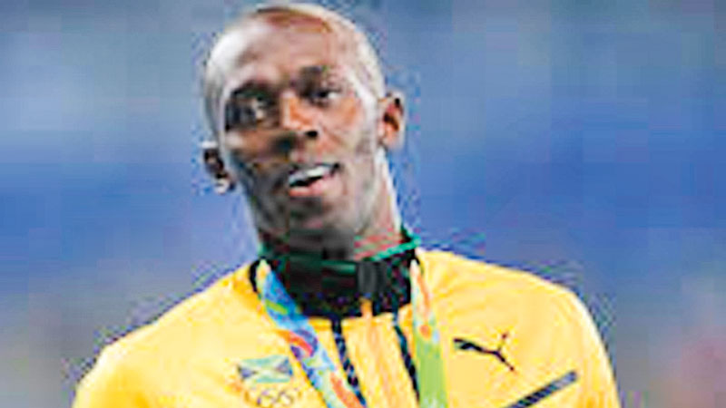 Bolt loses gold as IOC strips Jamaica of 2008 relay win