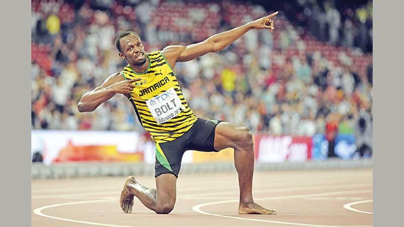 Bolt claims sprint double gold