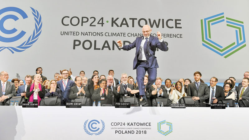 Nations agree rulebook for Paris climate treaty