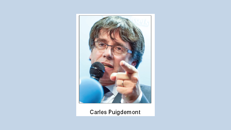 Puigdemont turns himself in to police