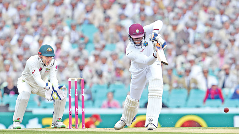 Brathwaite entertains fans on drab day