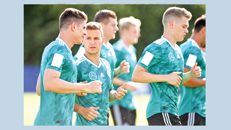 Champs seek to complete escape act