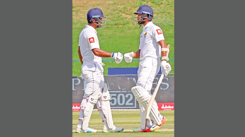 Karunaratne, Chandimal
lead Sri Lanka fightback 