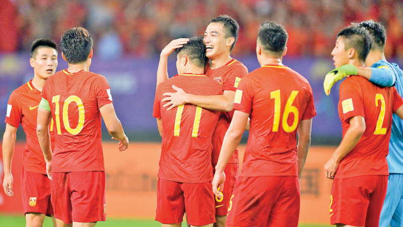 China dare to believe despite World Cup exit