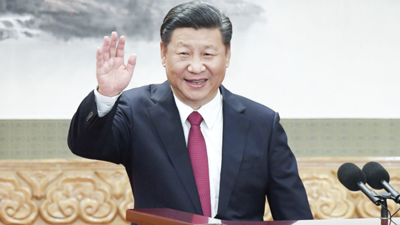 China crowns Xi with name once reserved for Mao Zedong