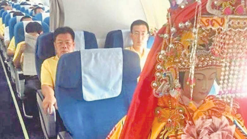 Chinese deities fly business class for SE Asia tour
