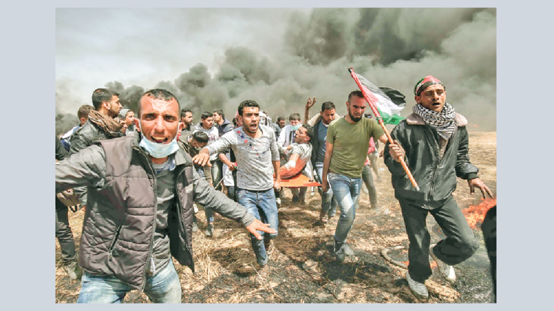 Clashes erupt as protests begin along Gaza border