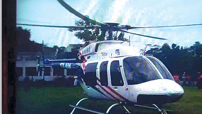 Copter lands in jail complex, pilot flees
