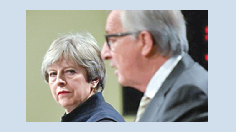 May fights to save deal after DUP backlash