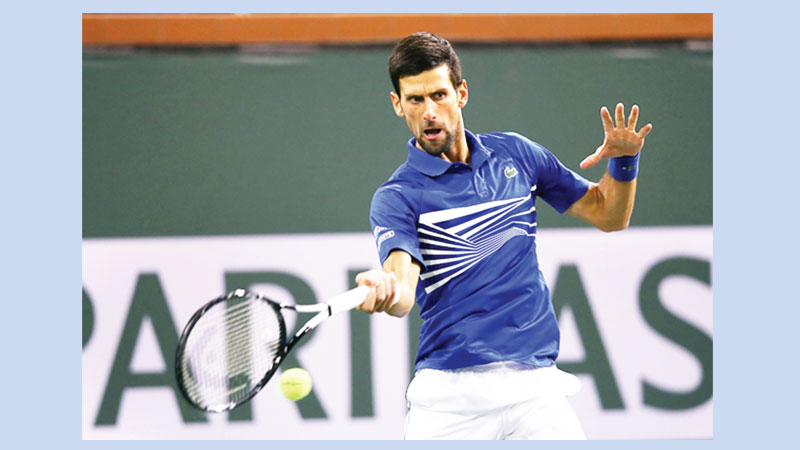 Djokovic eases past Kohlschreiber 