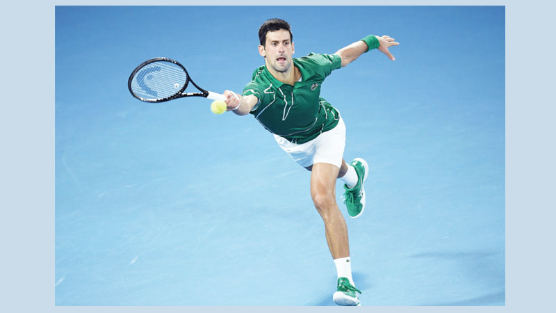 Djokovic powers past Federer 