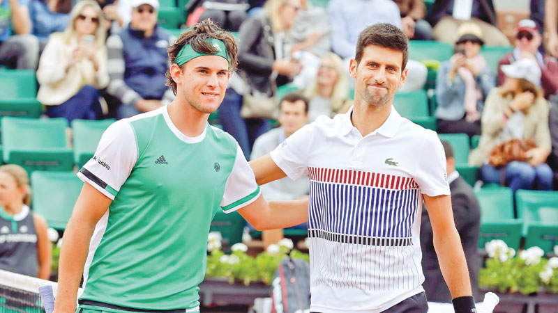 Thiem sends champ Djokovic packing 