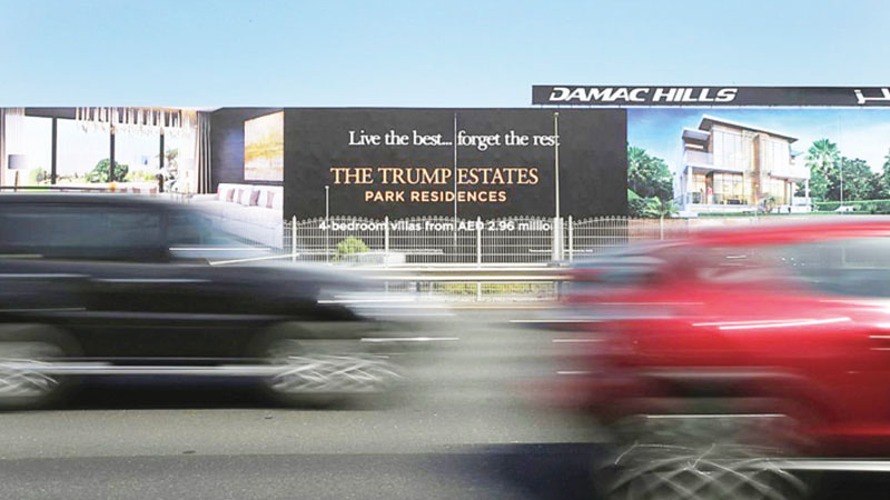 Dubai firm tied to Trump posts loss as virus downturn looms