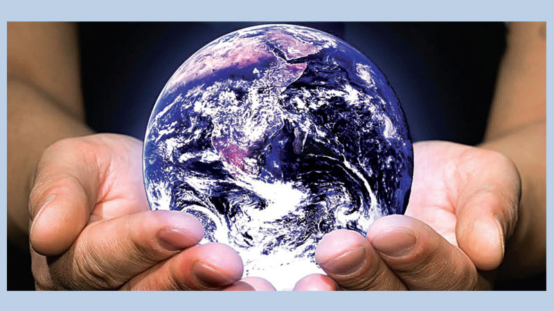 Earth in human hands 