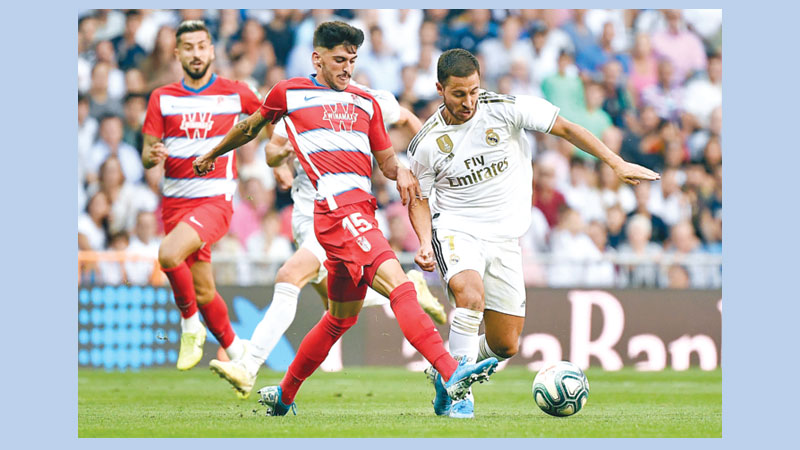 Eden Hazard off mark but Real make hard work of Granada