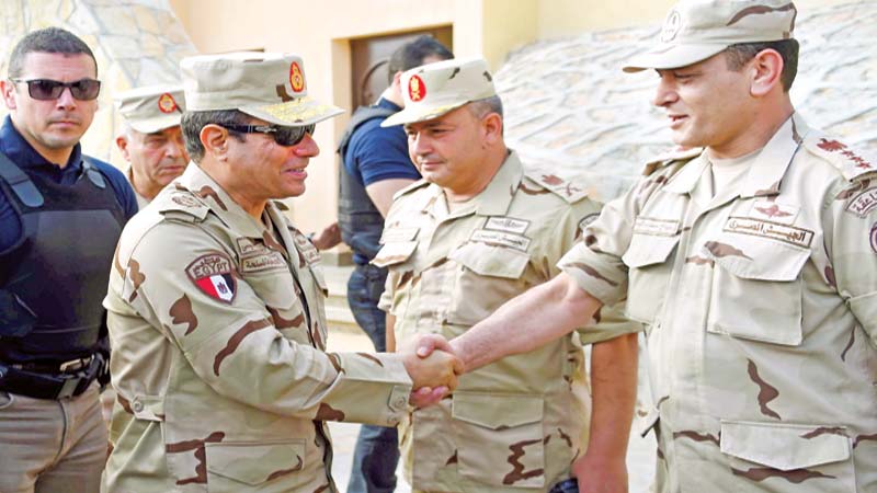 Egypts Sisi rallies troops 
in Sinai after IS attacks