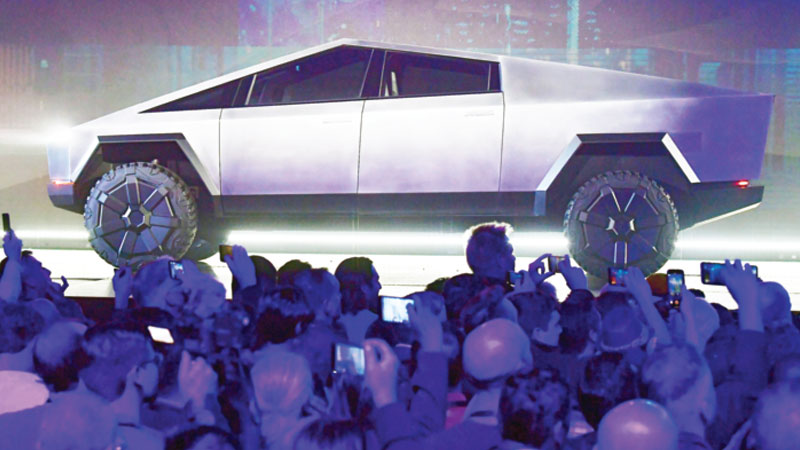 Electric automaker Tesla sees late year surge after a bumpy start