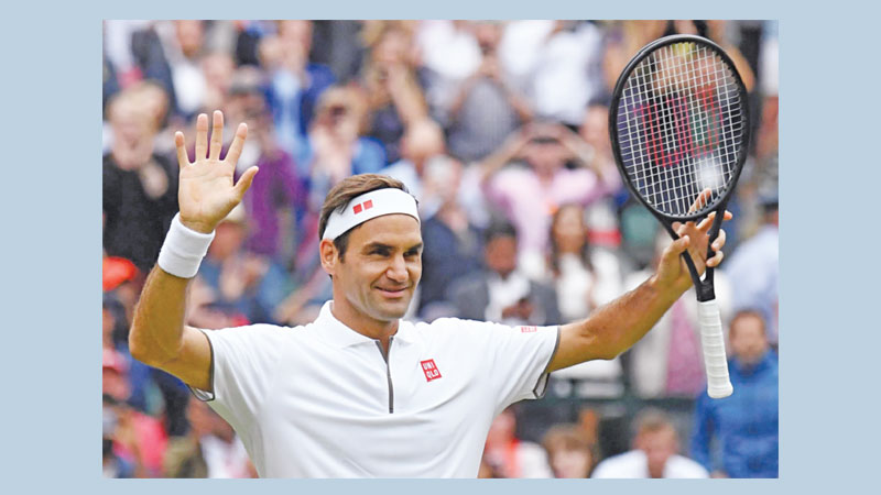 Federer, Nadal, Djokovic eases into quarters
